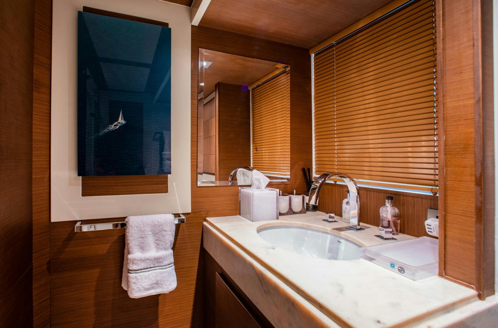 a bathroom with a large window aboard ARREEE! Yacht for Sale