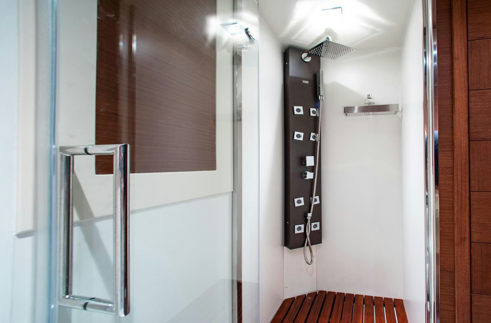 a hallway with a door and a red carpet aboard ARREEE! Yacht for Sale