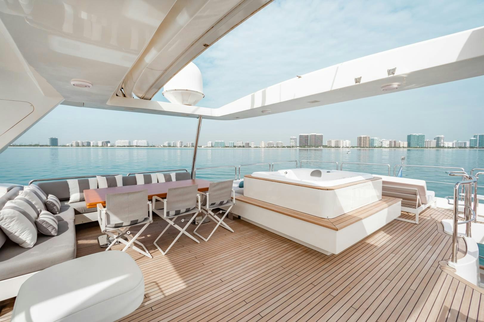a room with a bed and a couch aboard ARREEE! Yacht for Sale