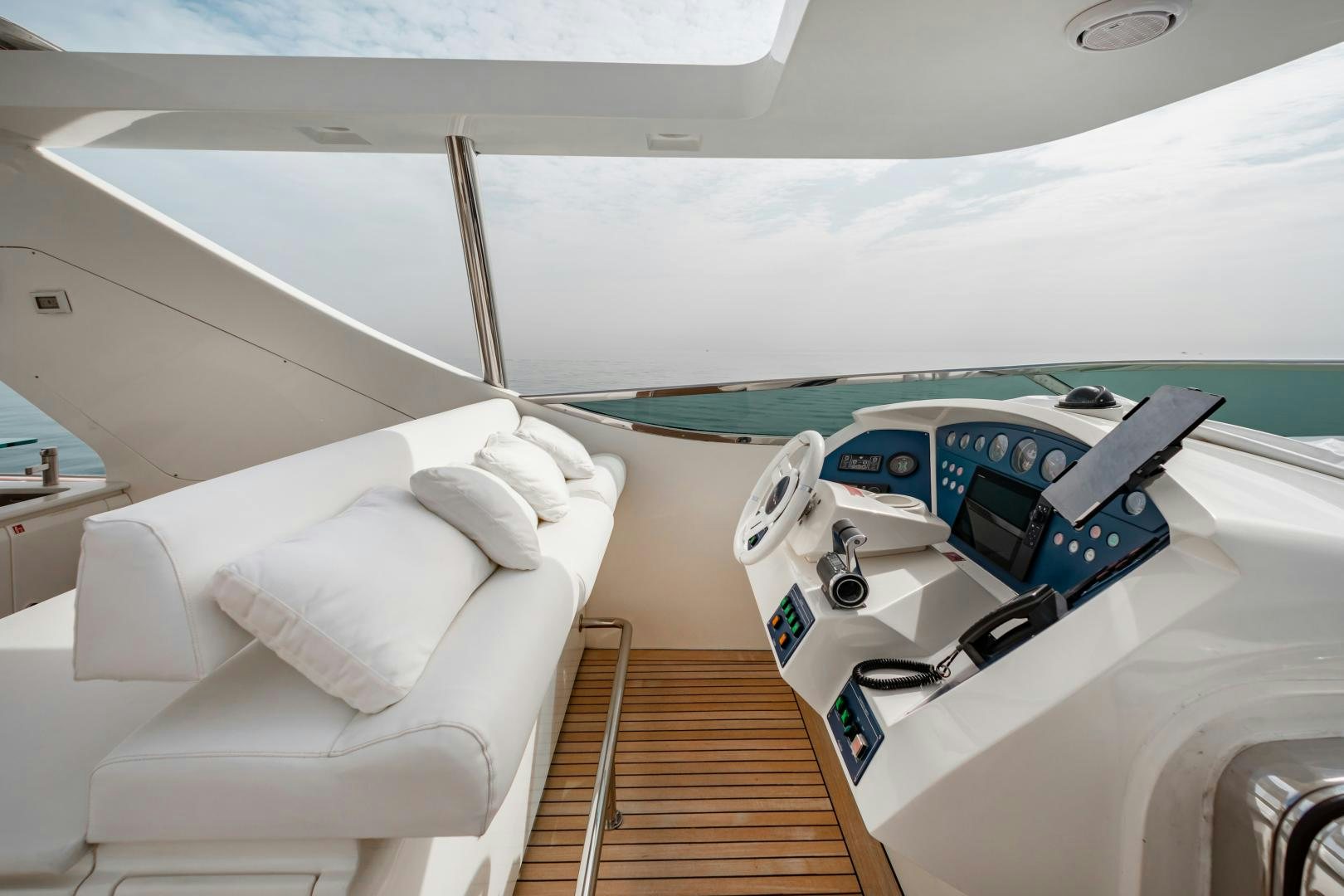 inside of a white car aboard ARREEE! Yacht for Sale