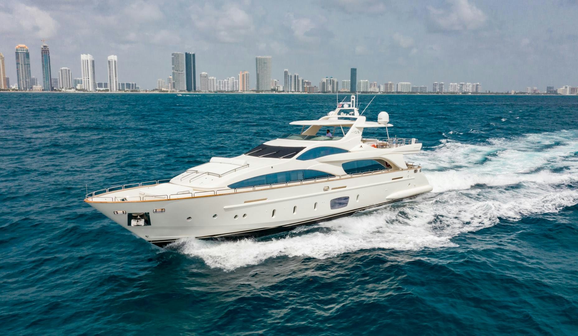 a white yacht on the water aboard ARREEE! Yacht for Sale