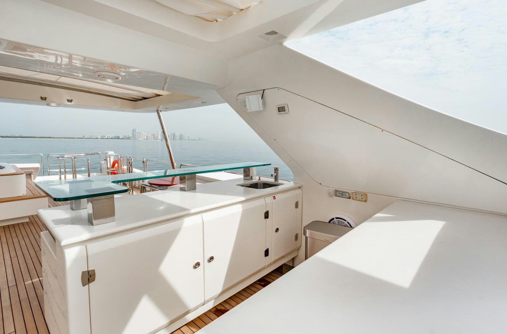 a kitchen with a large white counter aboard ARREEE! Yacht for Sale