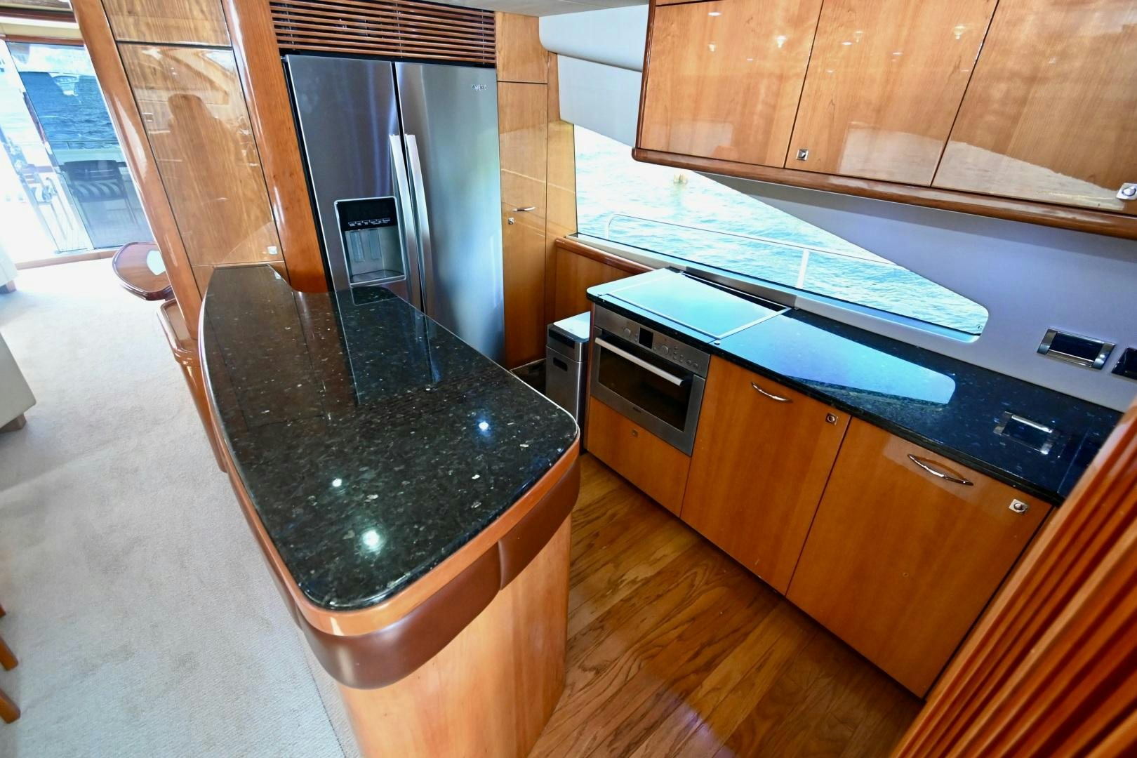 a kitchen with a marble counter top aboard BELLA Yacht for Sale