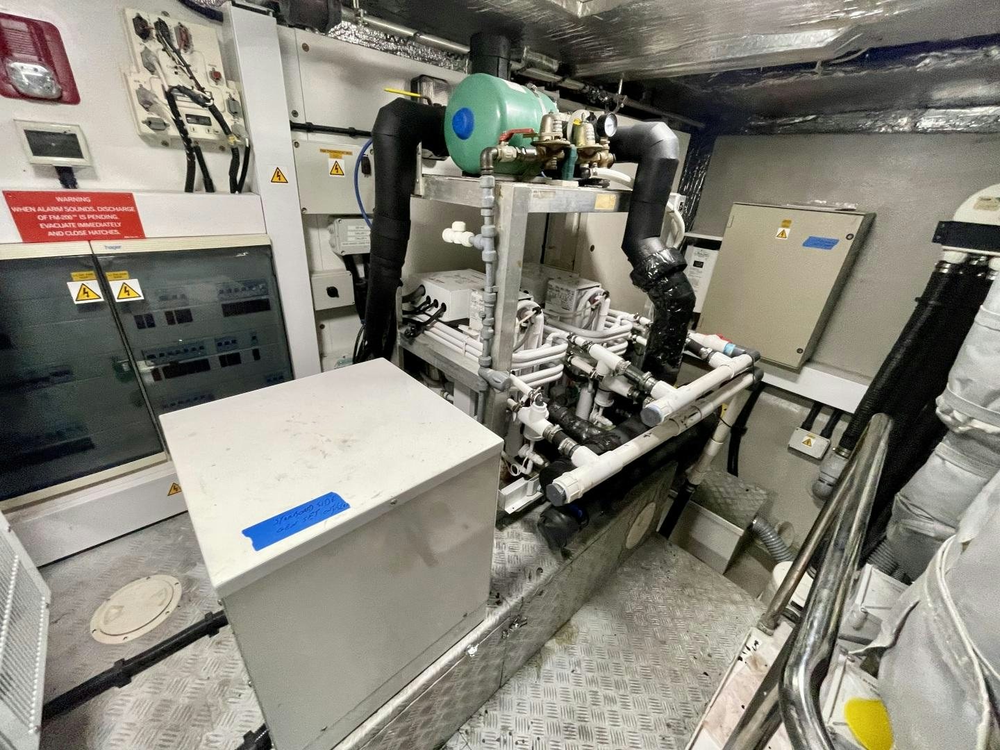 a machine in a room aboard BELLA Yacht for Sale