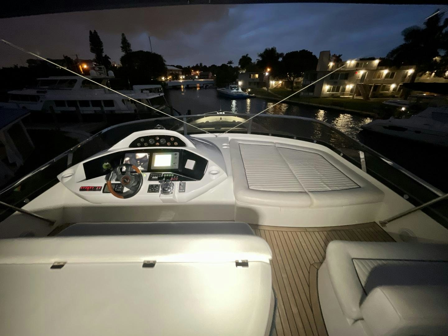 a white car on a road aboard BELLA Yacht for Sale