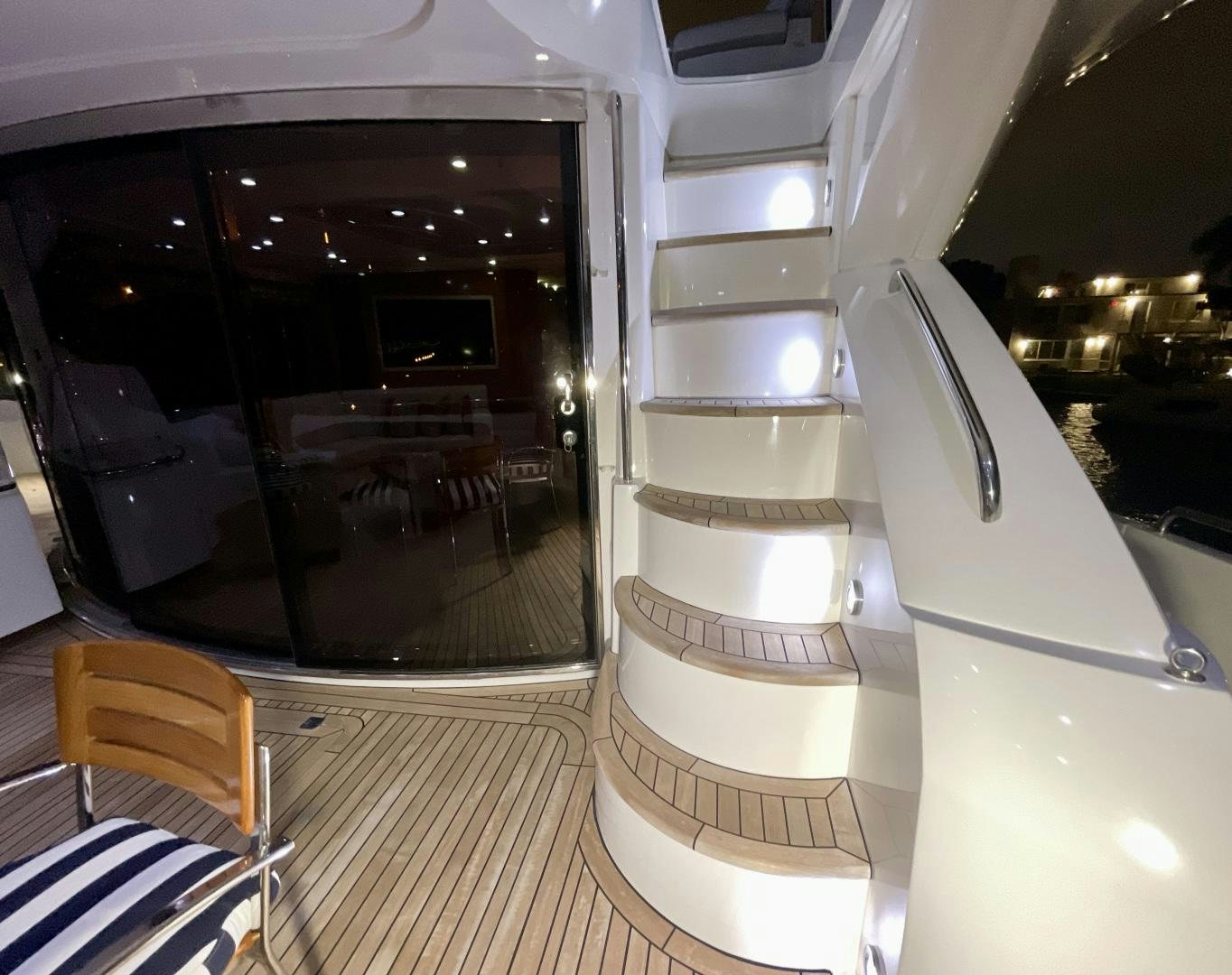 a white rectangular object with a glass door and a white wall aboard BELLA Yacht for Sale