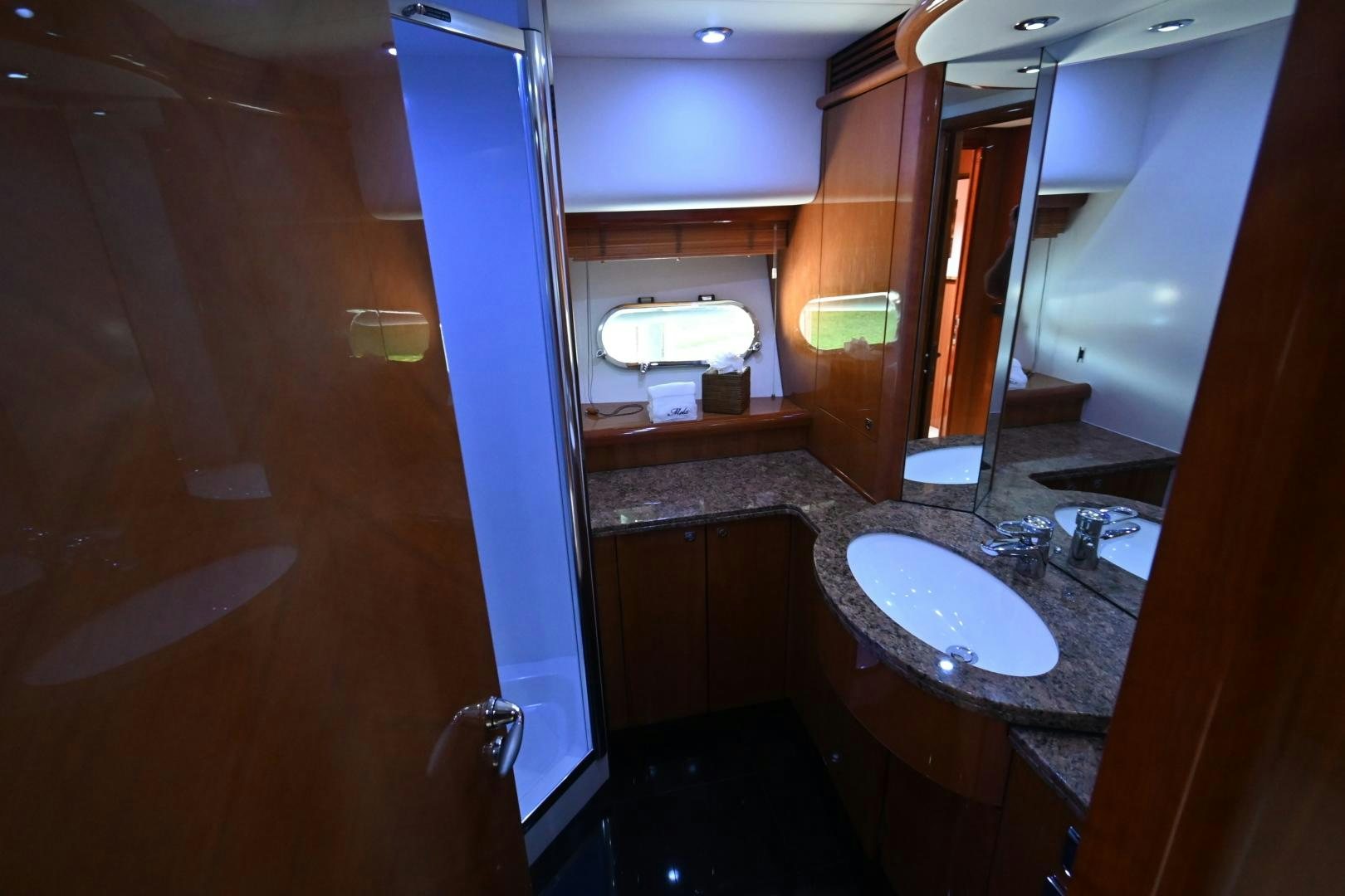 a bathroom with a sink and a mirror aboard BELLA Yacht for Sale