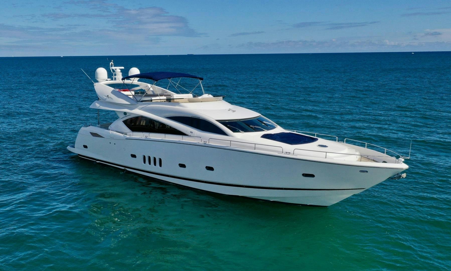 a white yacht in the water aboard BELLA Yacht for Sale