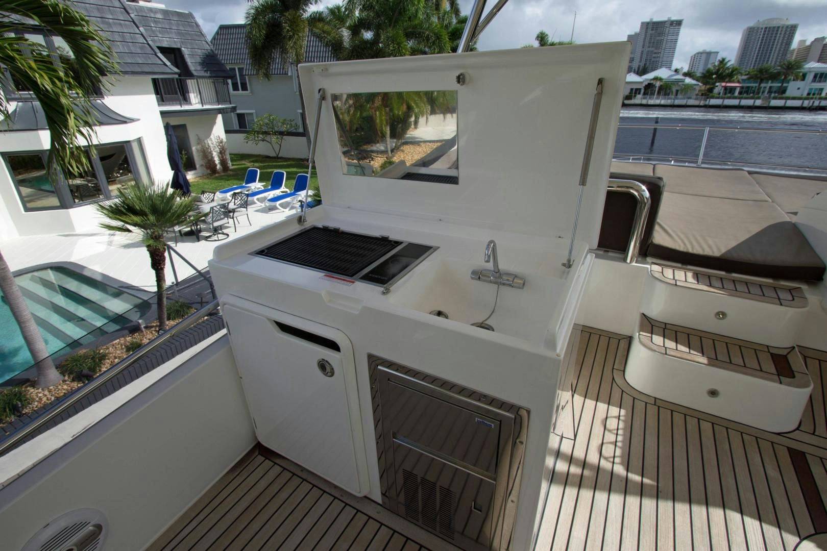 a white boat on a deck aboard MOODSWING Yacht for Sale