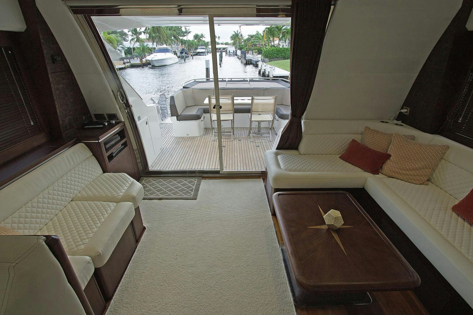 a room with a bed and a table aboard MOODSWING Yacht for Sale