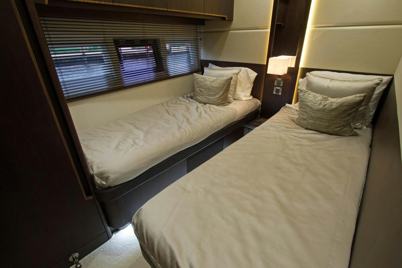 a couple of beds in a hotel room aboard MOODSWING Yacht for Sale