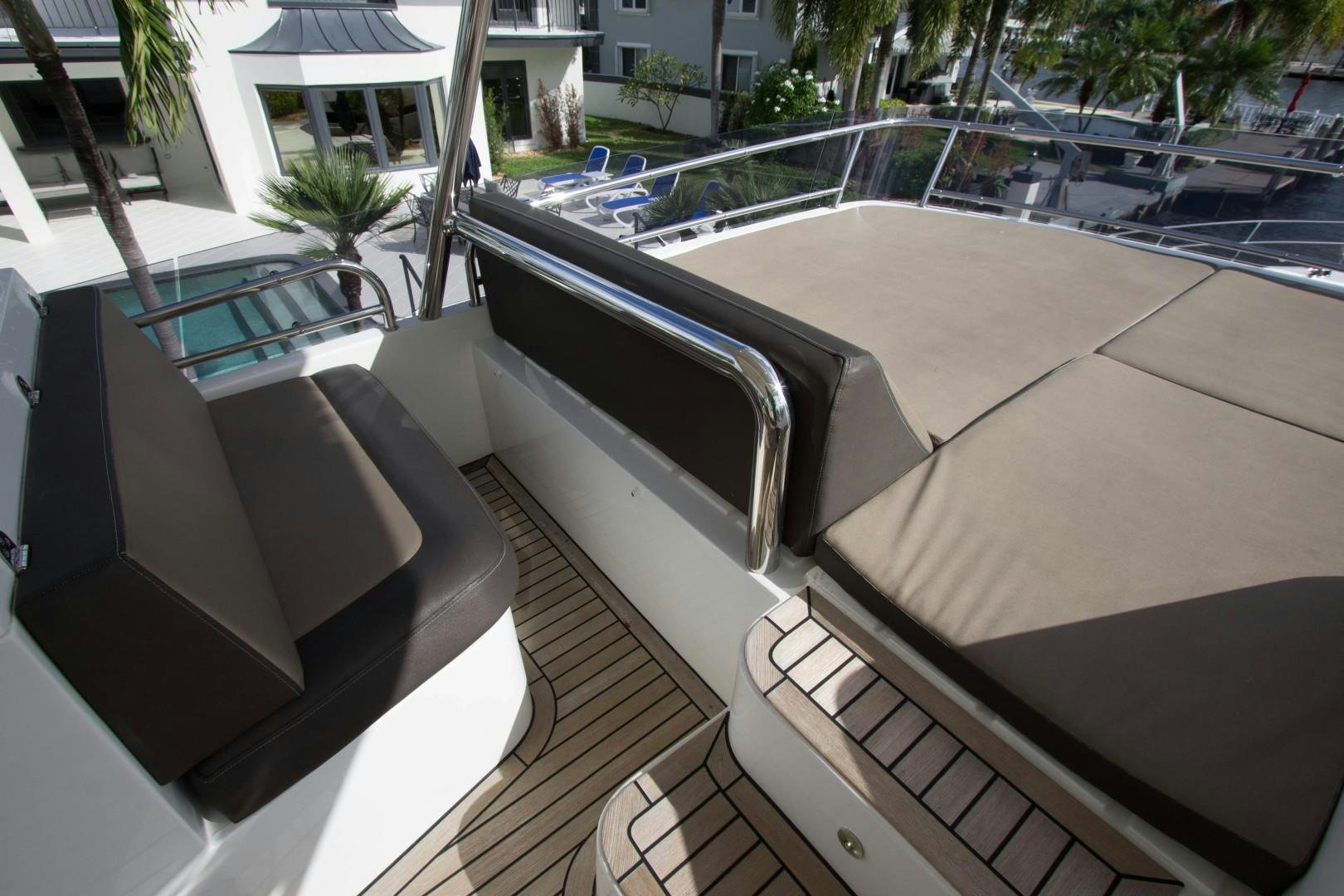 a deck with a pool aboard MOODSWING Yacht for Sale
