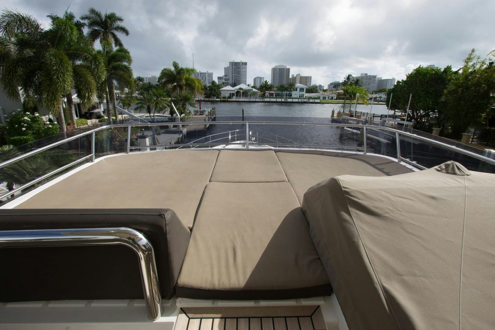 a balcony with a pool and trees aboard MOODSWING Yacht for Sale