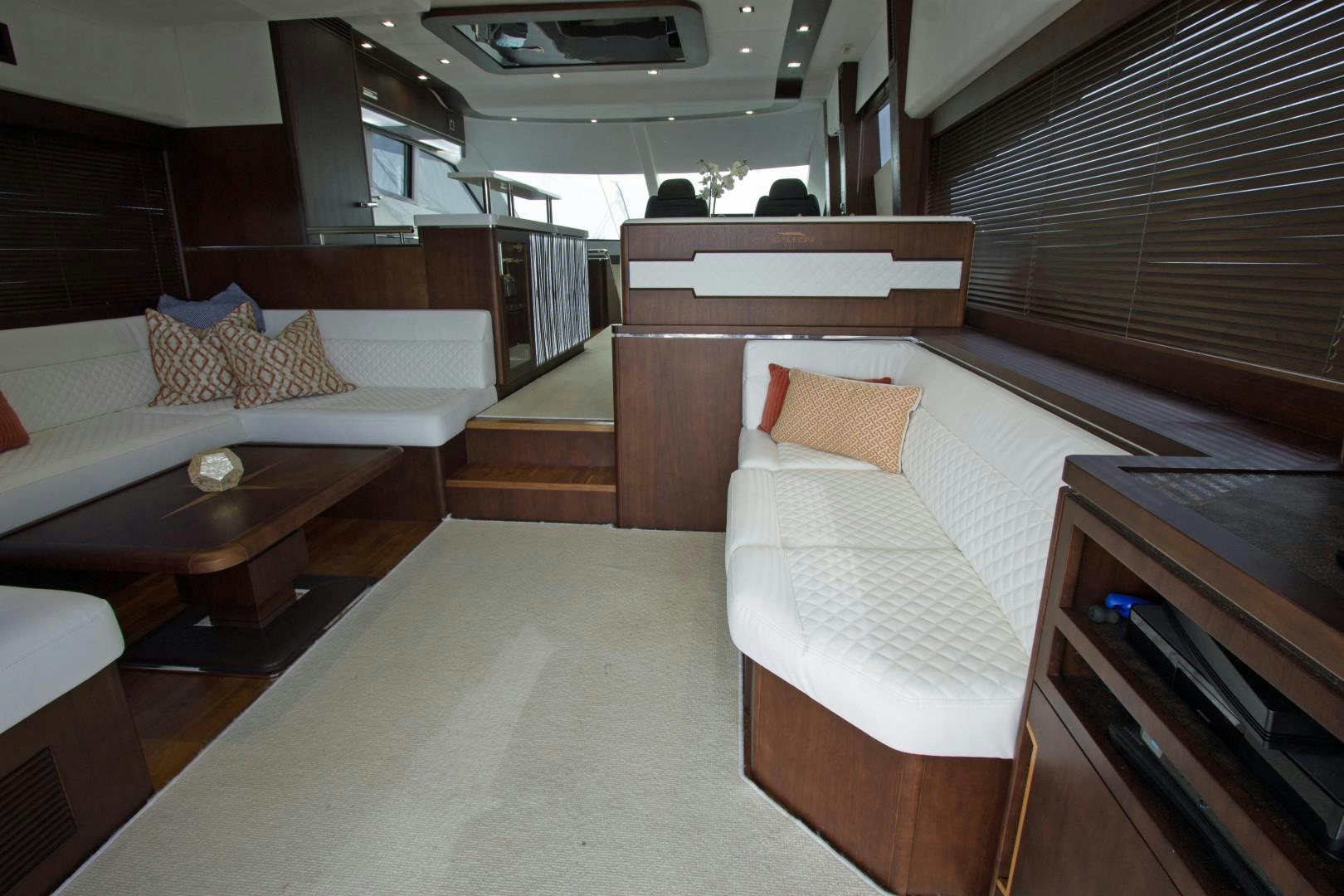 a room with a bed and a table aboard MOODSWING Yacht for Sale