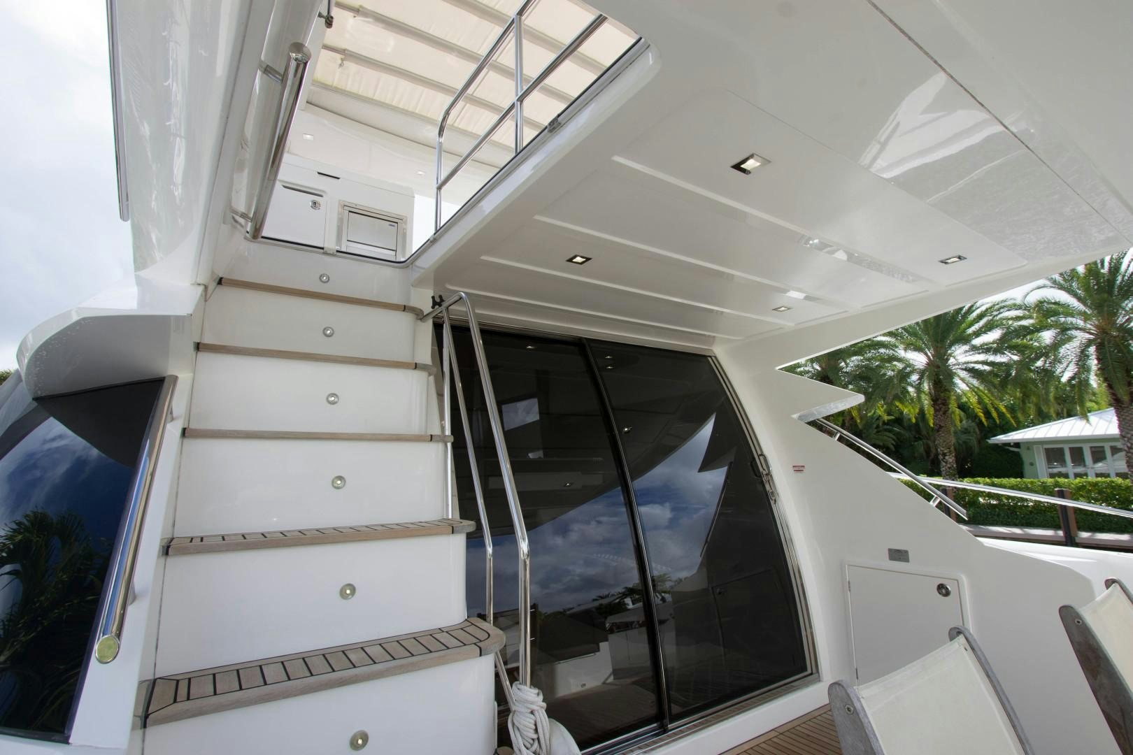 a white wooden staircase aboard MOODSWING Yacht for Sale
