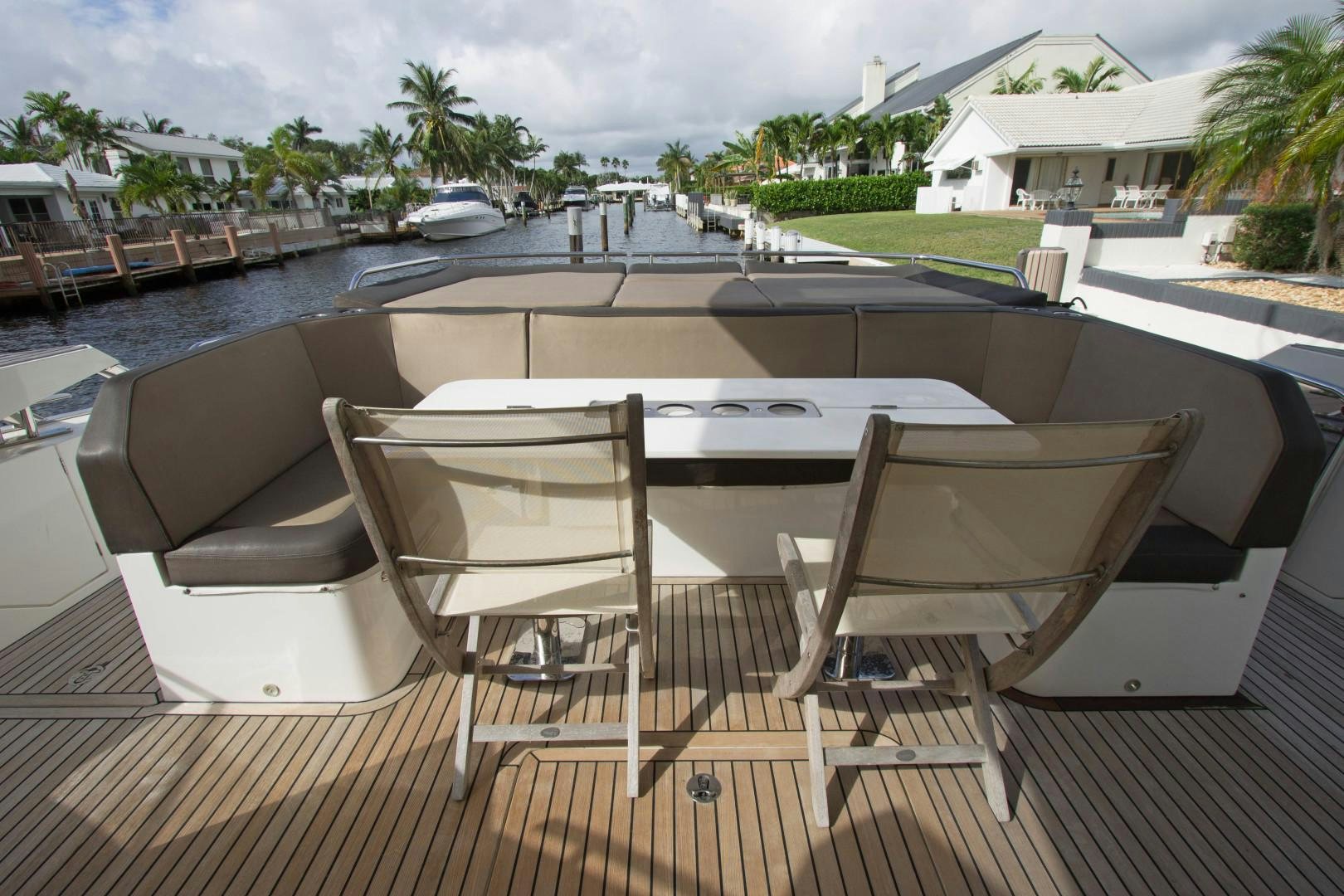 a table and chairs on a deck aboard MOODSWING Yacht for Sale