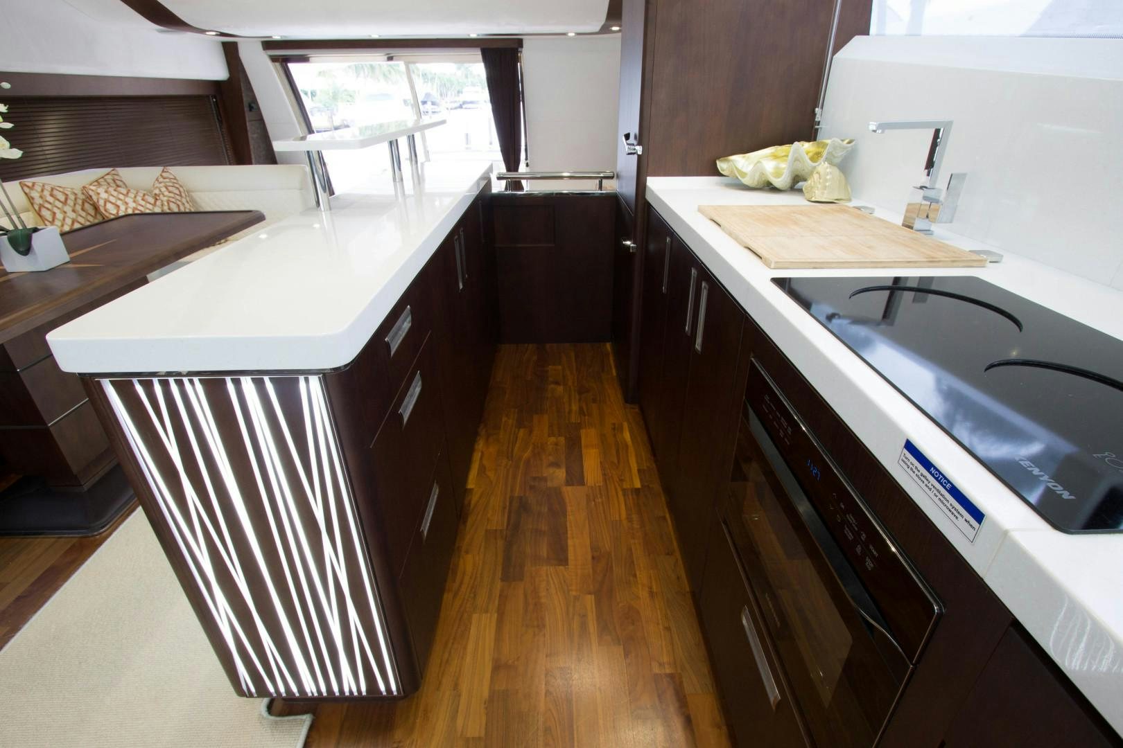 a kitchen with a sink and a window aboard MOODSWING Yacht for Sale
