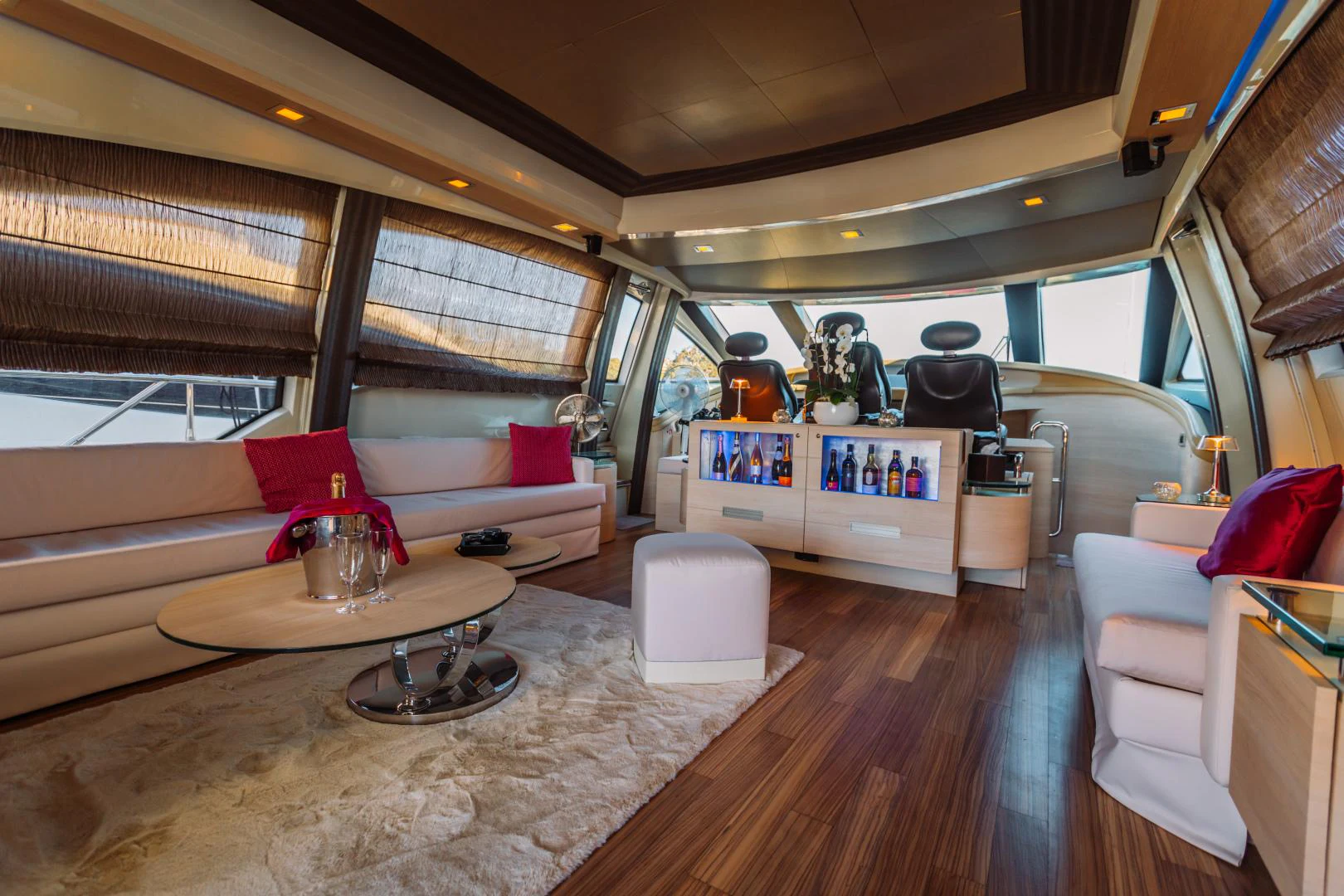 a living room with a large window aboard NAMI Yacht for Sale
