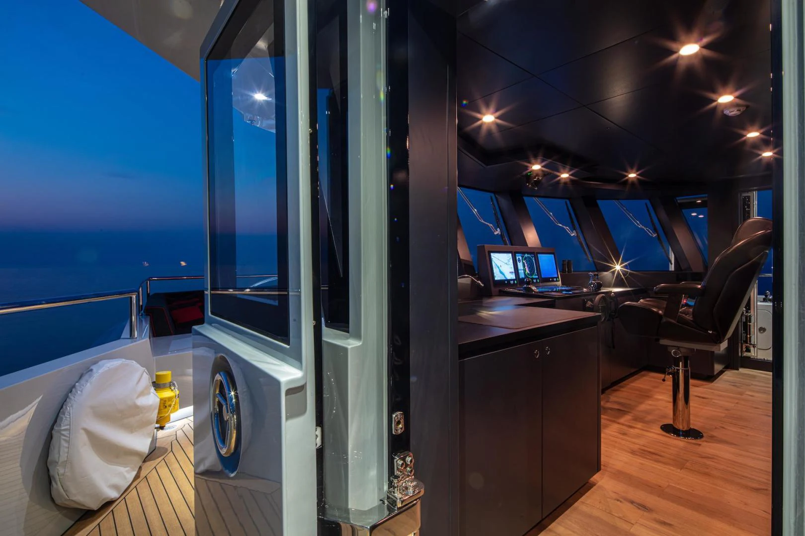 a room with a large window aboard ATOM Yacht for Sale