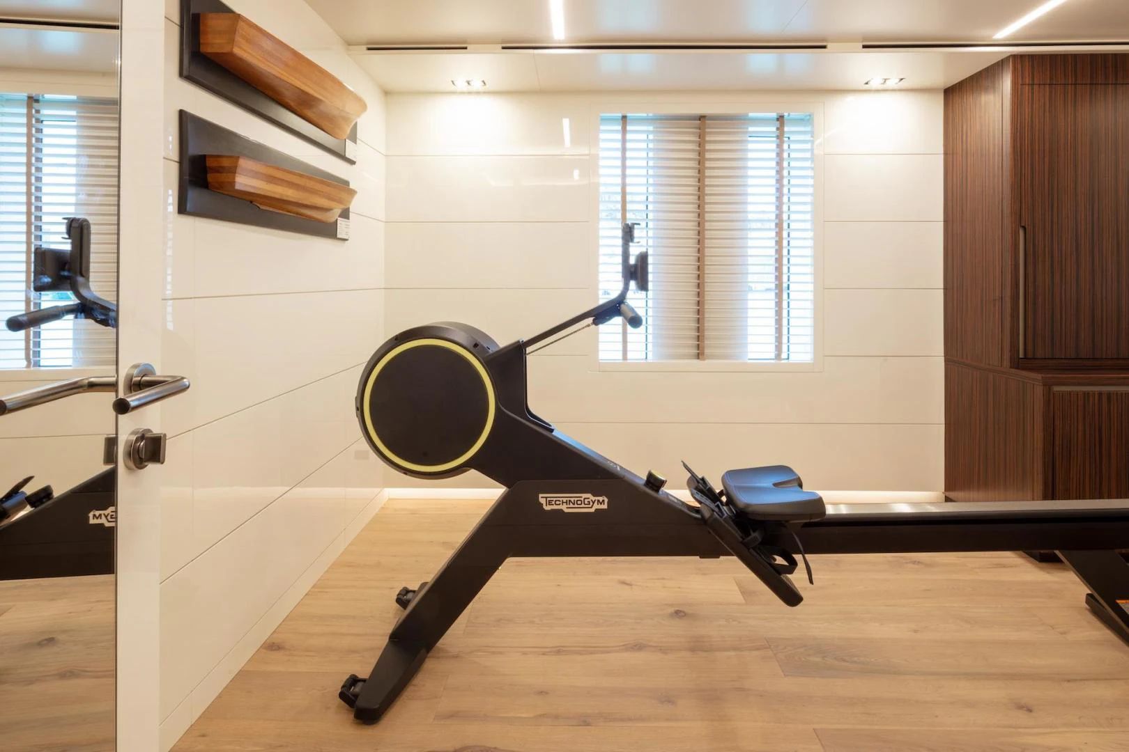 a gym with a gym aboard ATOM Yacht for Sale