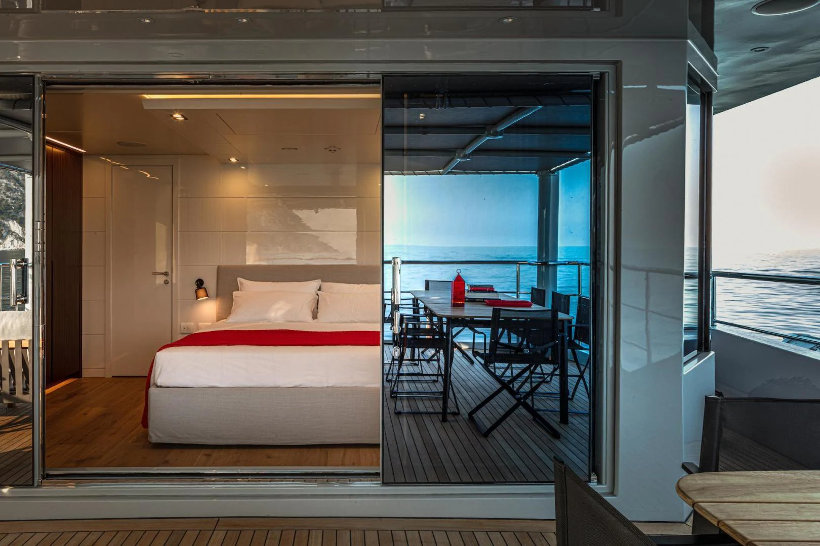 a bed in a room aboard ATOM Yacht for Sale