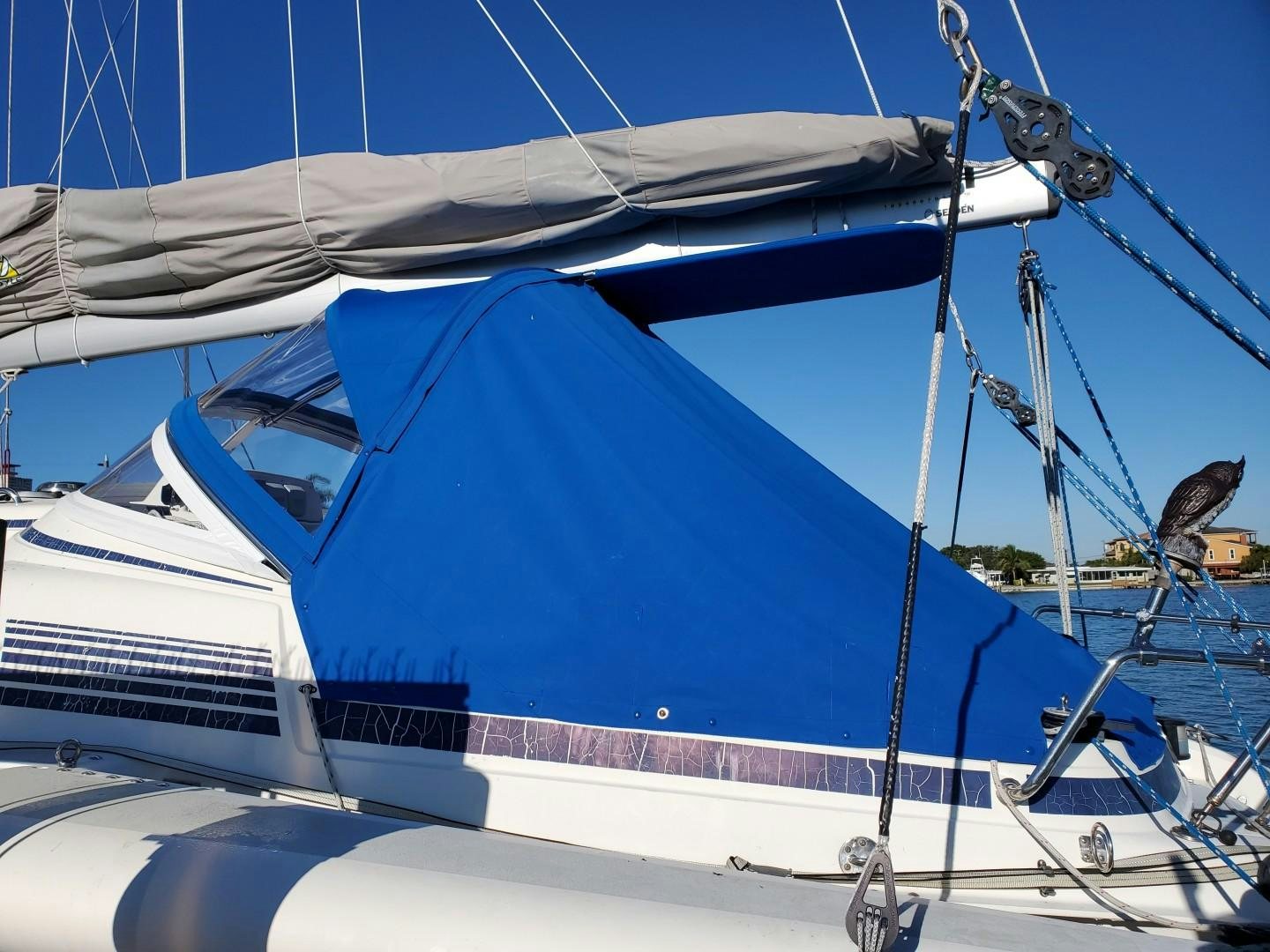 a boat with a blue canopy aboard VICTORNOMI Yacht for Sale