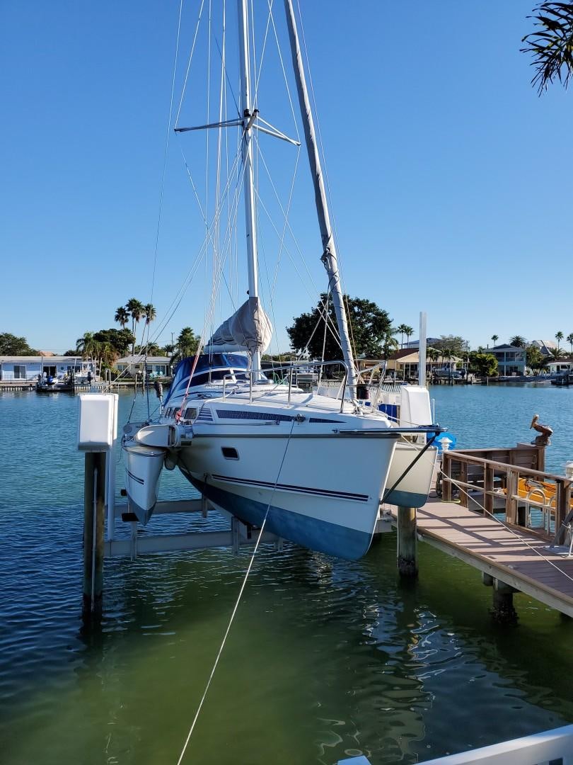 a boat docked at a pier aboard VICTORNOMI Yacht for Sale
