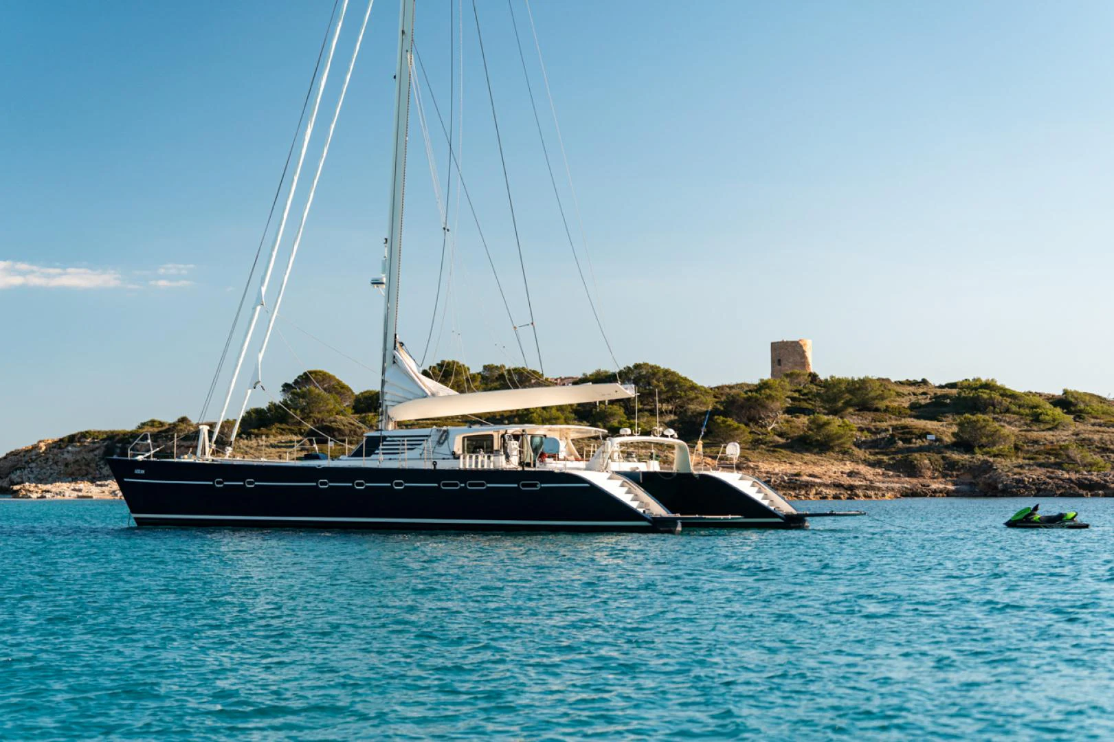 a boat sailing on the water aboard AZIZAM Yacht for Sale