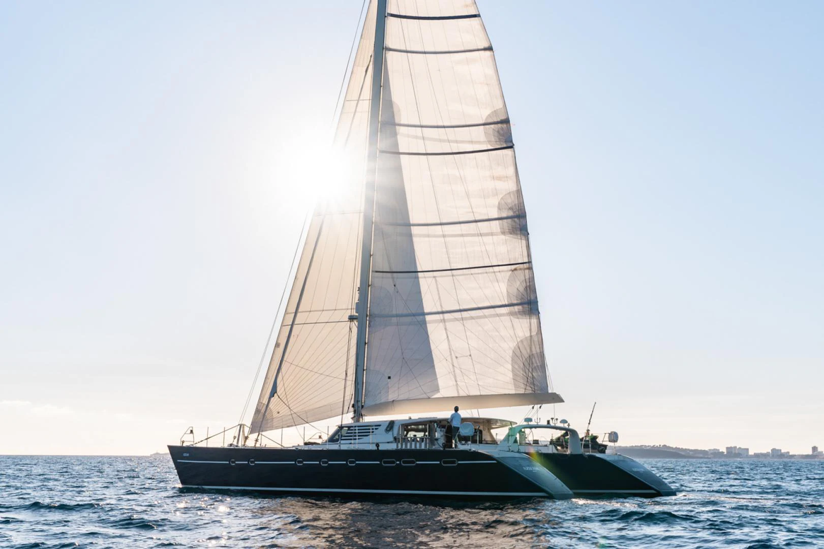 a sailboat on the water aboard AZIZAM Yacht for Sale