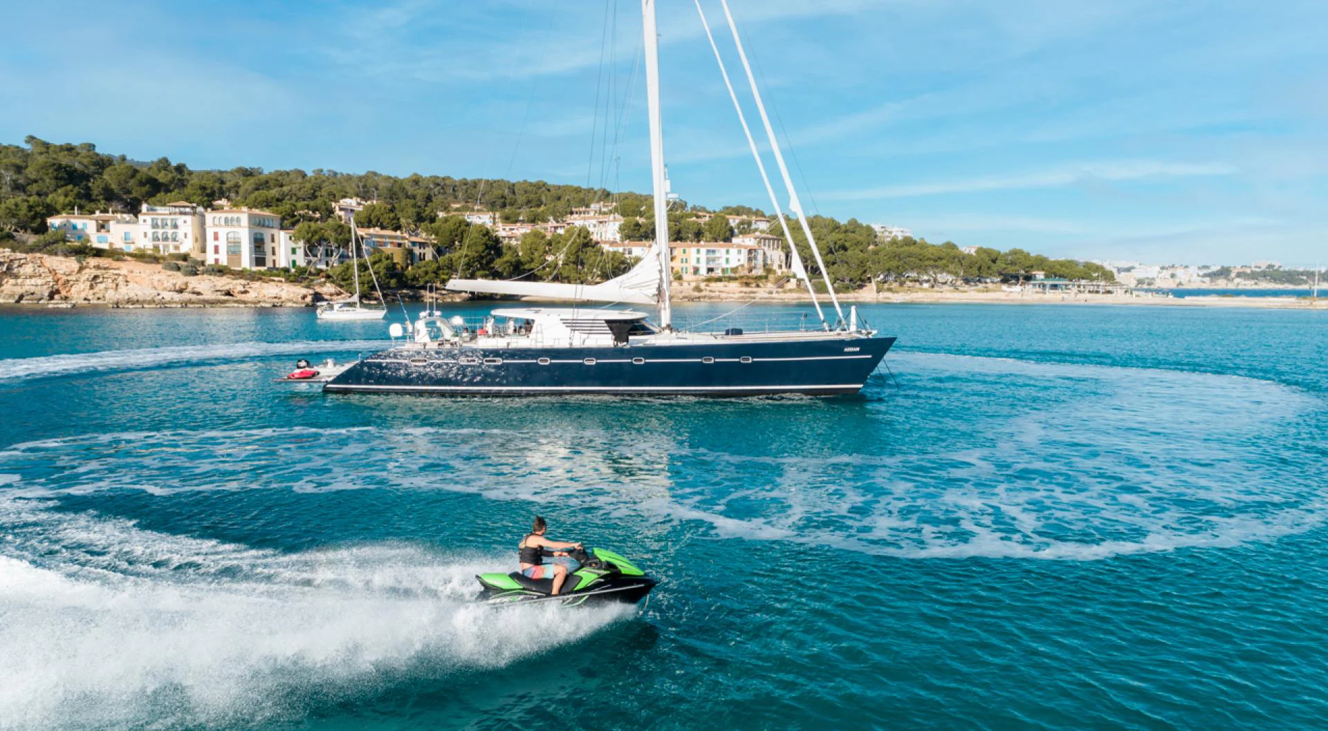 a person on a sailboat aboard AZIZAM Yacht for Sale