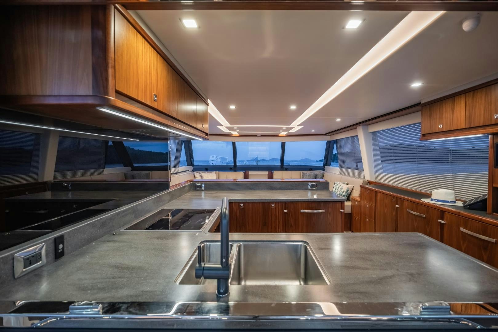 a kitchen with a large island aboard FAT BOY Yacht for Sale