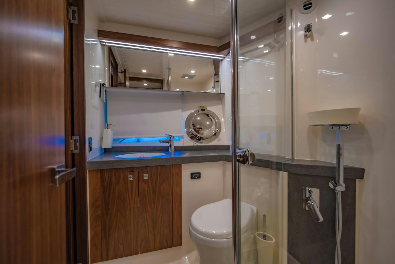 a bathroom with a glass shower aboard FAT BOY Yacht for Sale