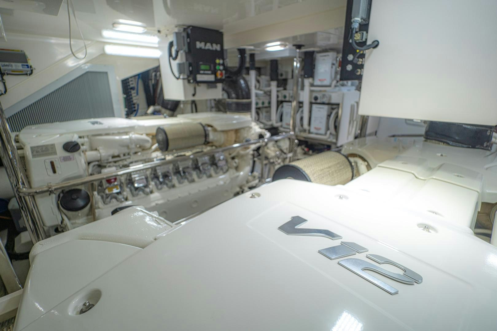 a machine in a room aboard FAT BOY Yacht for Sale