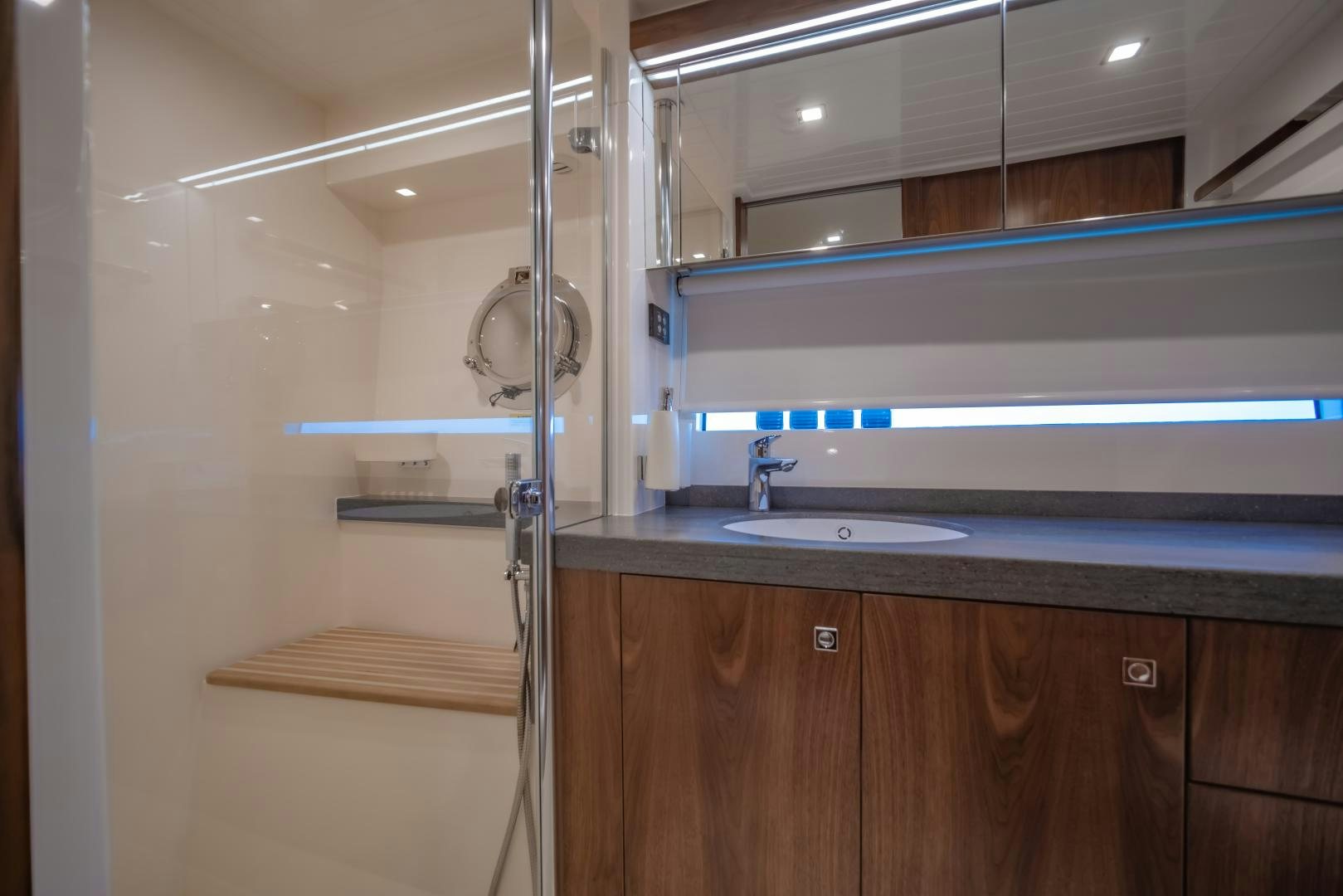 a bathroom with a sink and a mirror aboard FAT BOY Yacht for Sale