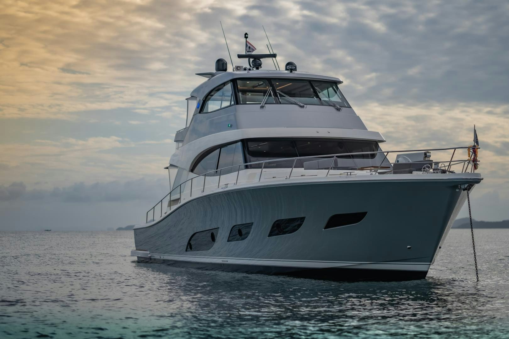 a white yacht in the water aboard FAT BOY Yacht for Sale