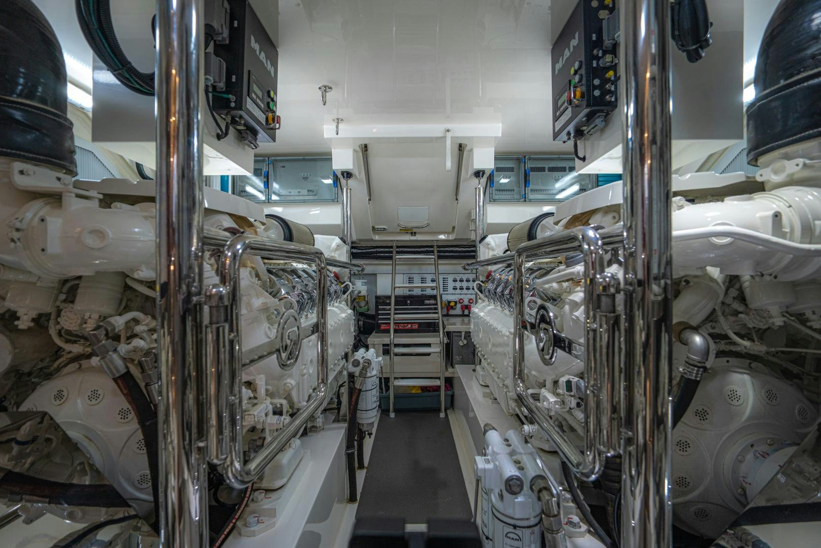 a large machine in a room aboard FAT BOY Yacht for Sale