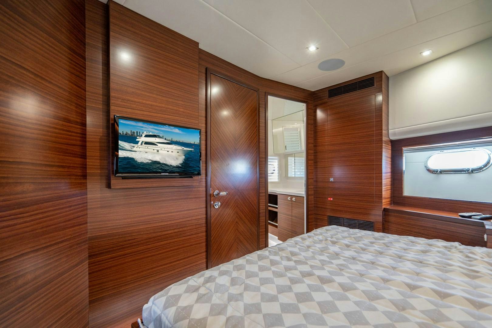 a bed in a room aboard LIFE Yacht for Sale