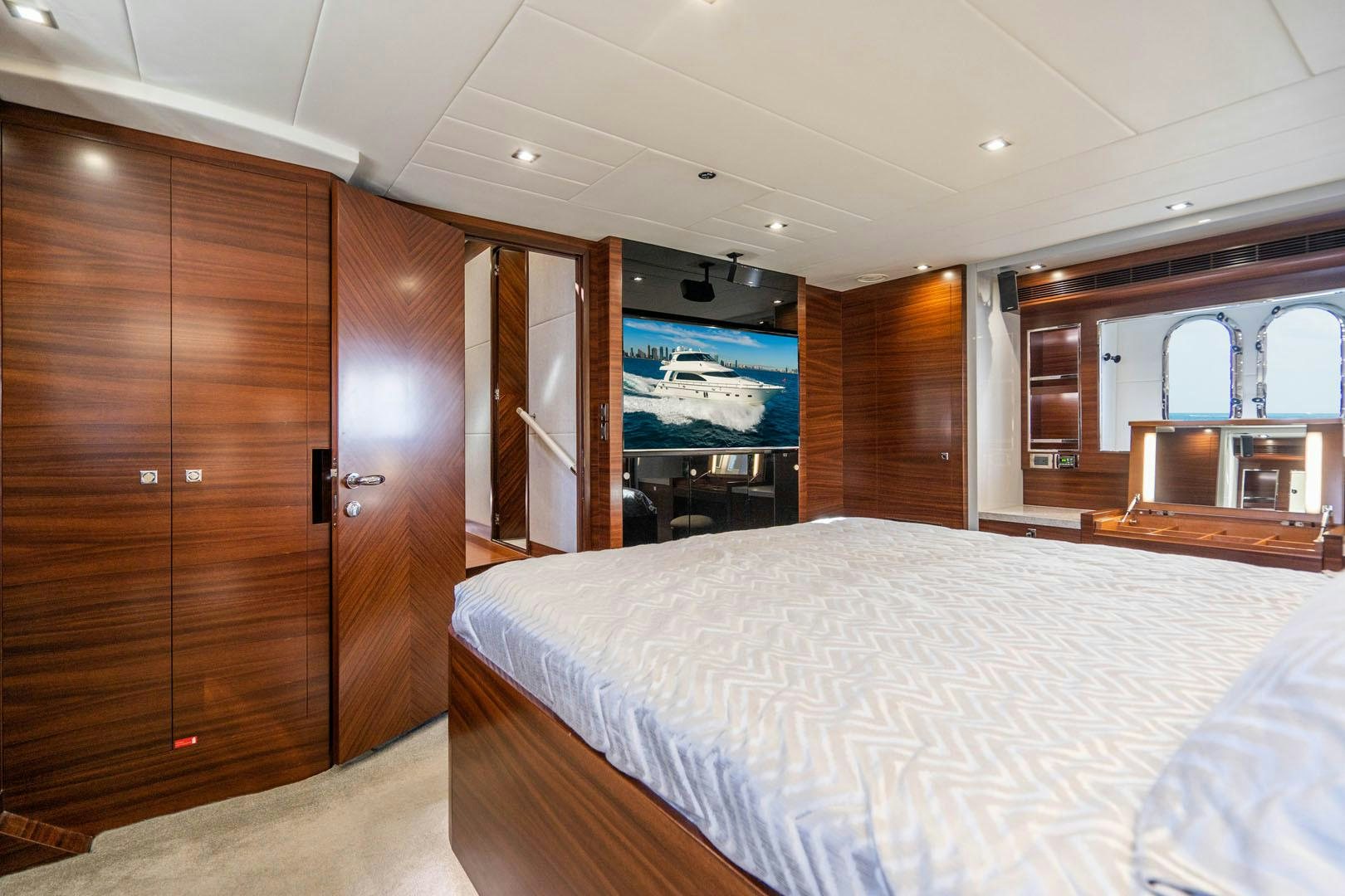 a bed in a room aboard LIFE Yacht for Sale