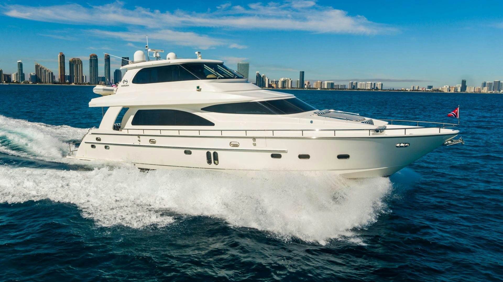 a white yacht on the water aboard LIFE Yacht for Sale