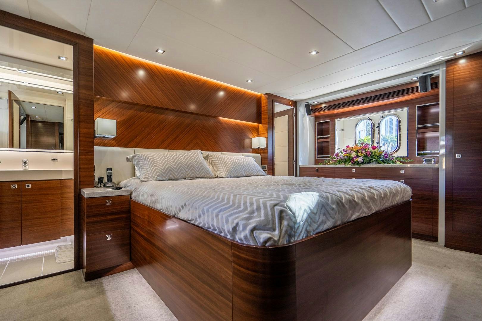 a large bed in a room aboard LIFE Yacht for Sale