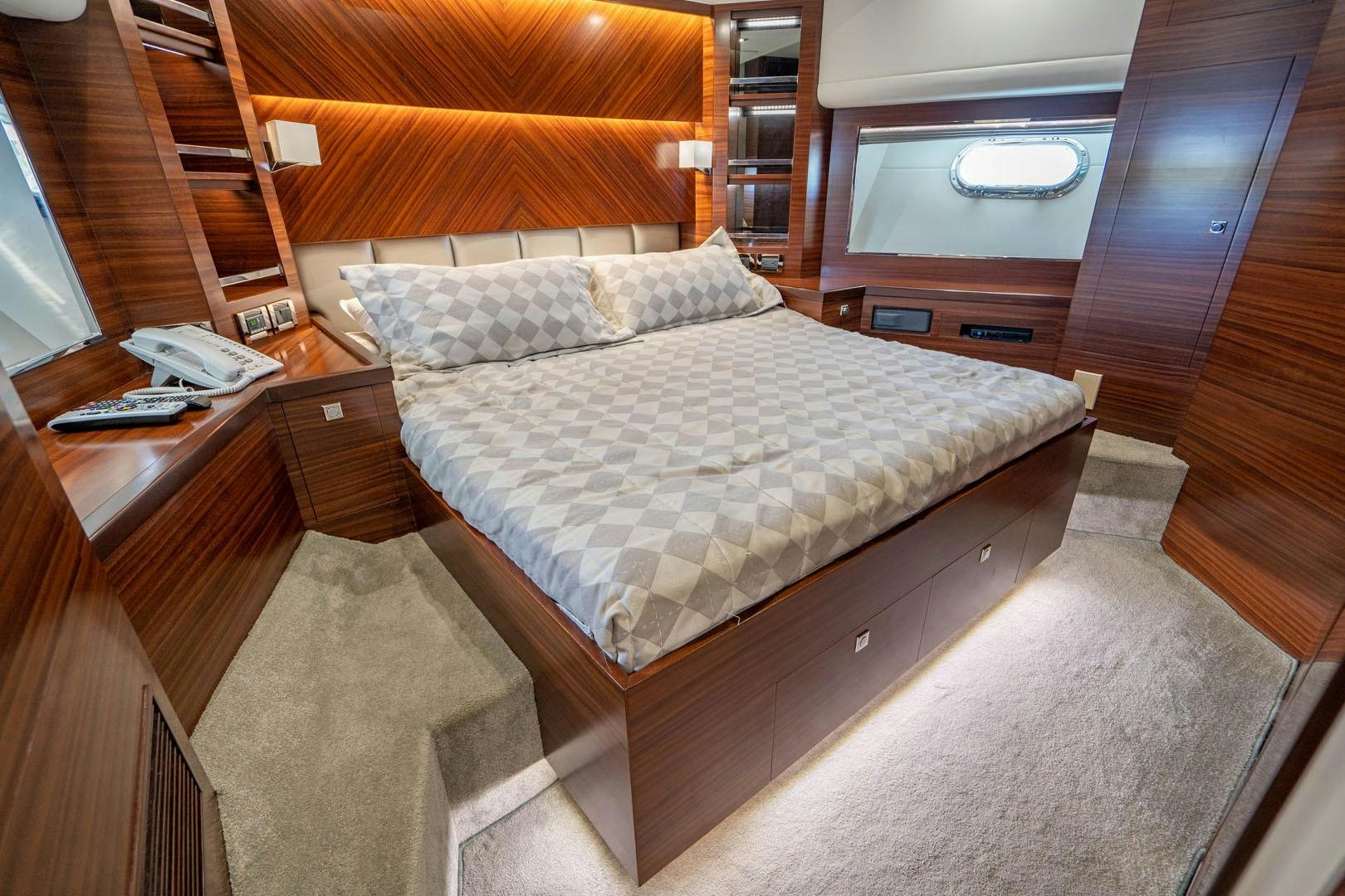 a bed in a room aboard LIFE Yacht for Sale