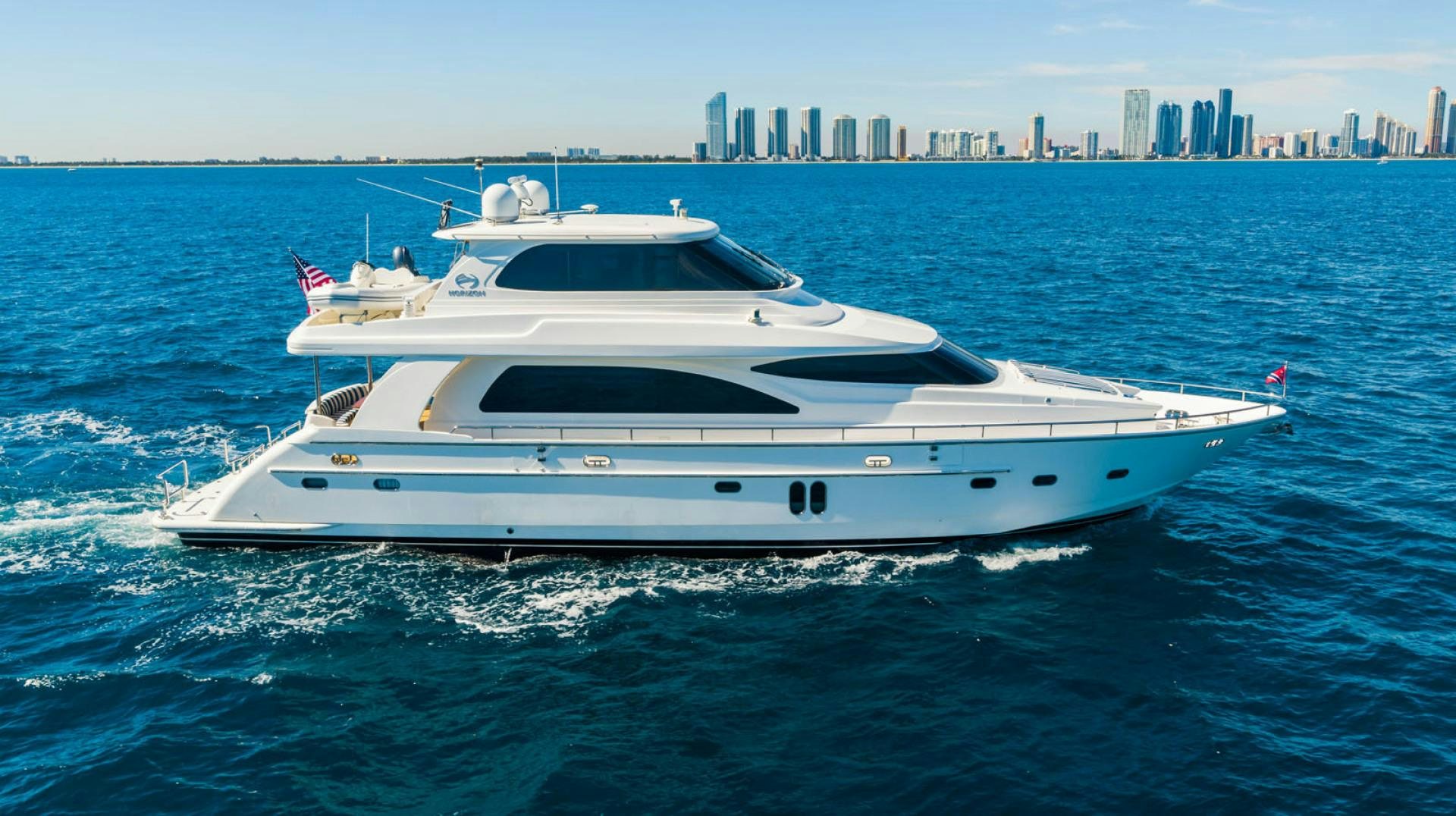 a white yacht on the water aboard LIFE Yacht for Sale