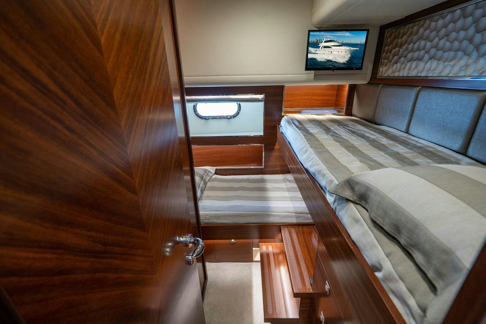 a bed in a room aboard LIFE Yacht for Sale