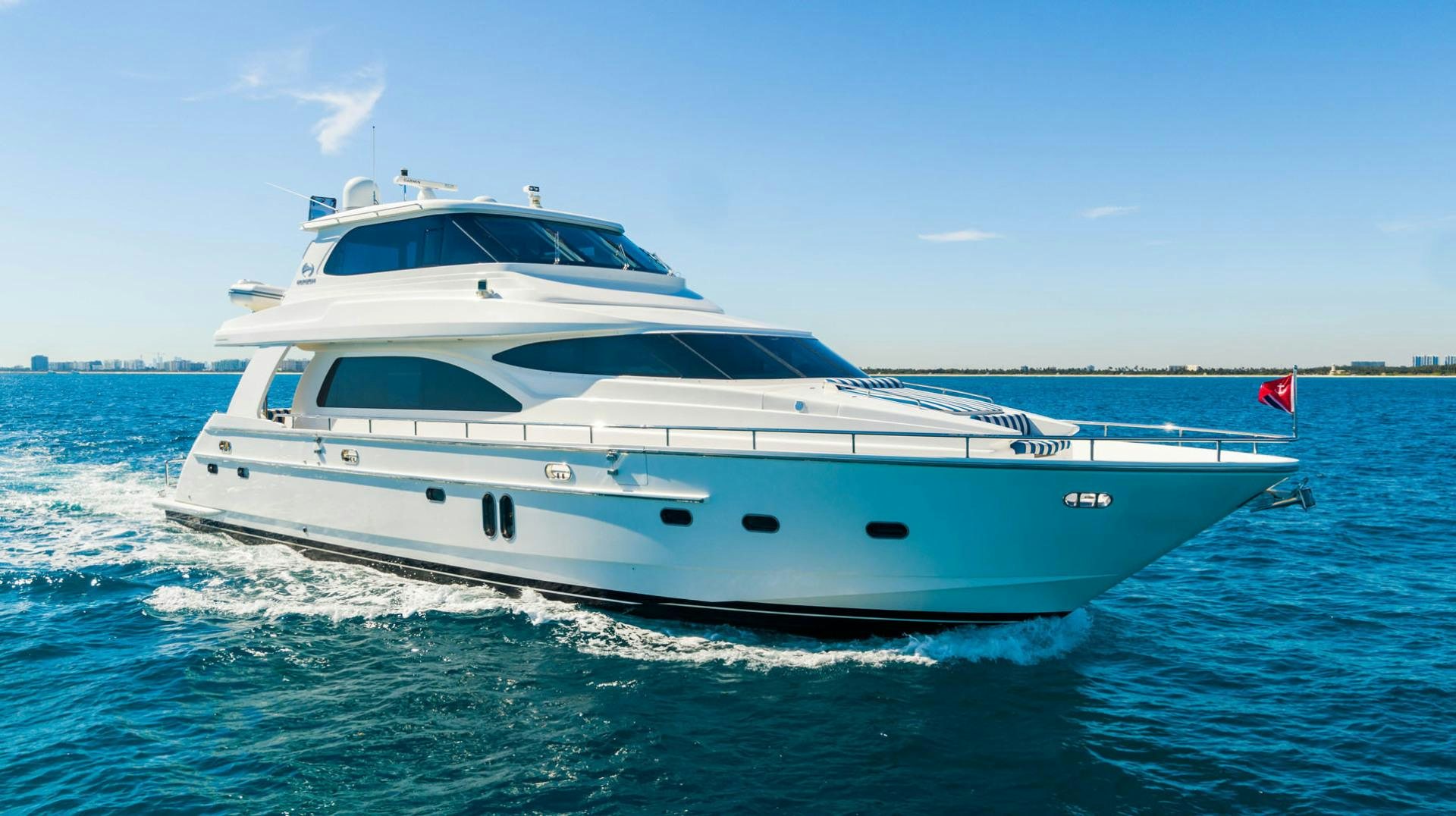 a white yacht on the water aboard LIFE Yacht for Sale