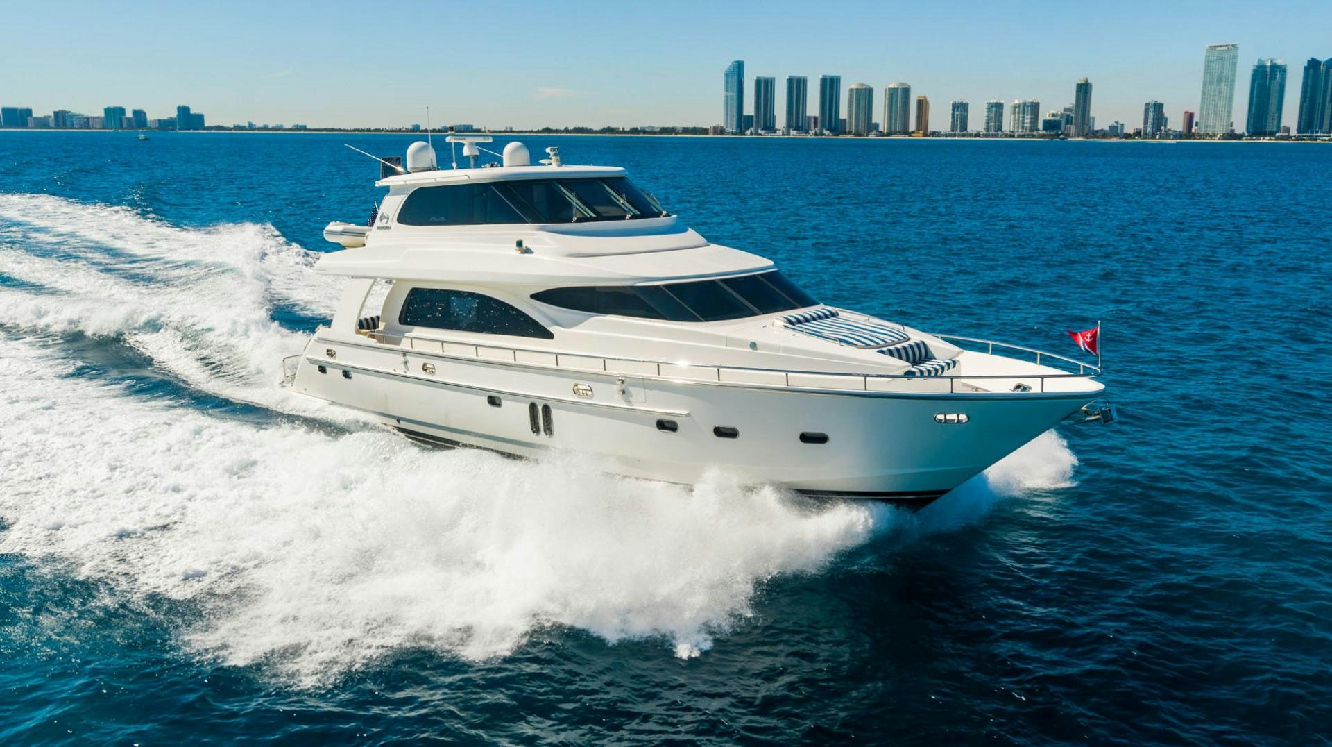 a white yacht on the water aboard LIFE Yacht for Sale