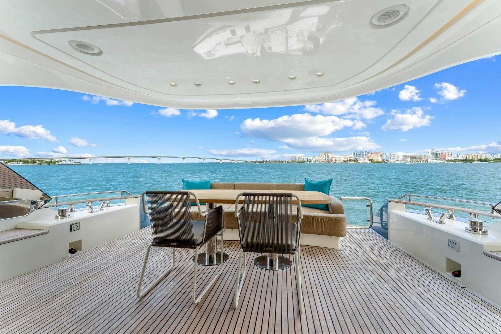a table and chairs on a boat aboard MONTE CARLO Yacht for Sale