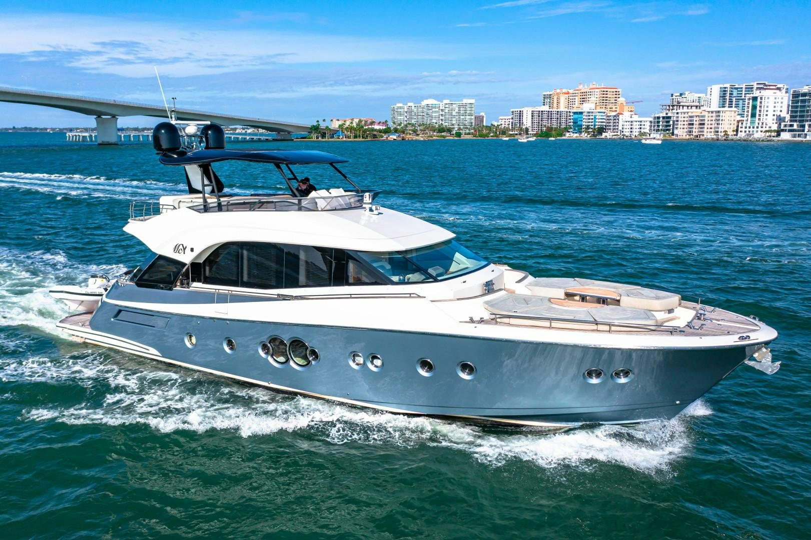 a white yacht in the water aboard MONTE CARLO Yacht for Sale