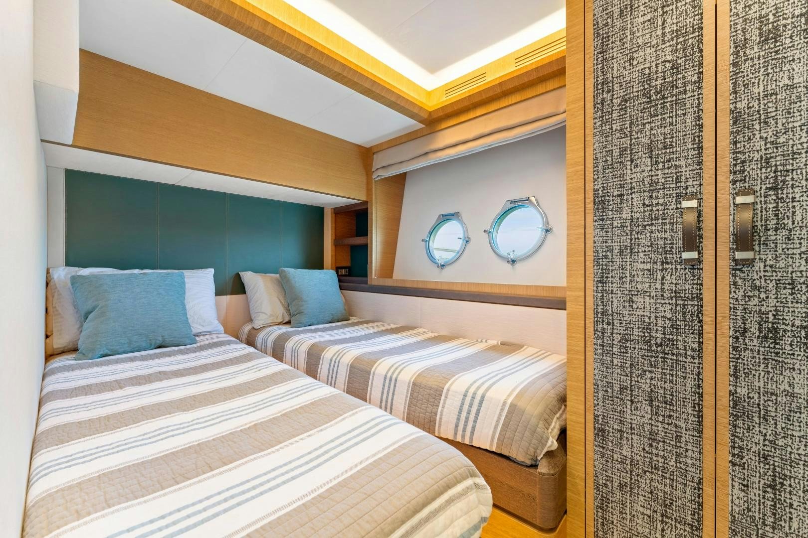 a couple of beds in a room aboard MONTE CARLO Yacht for Sale