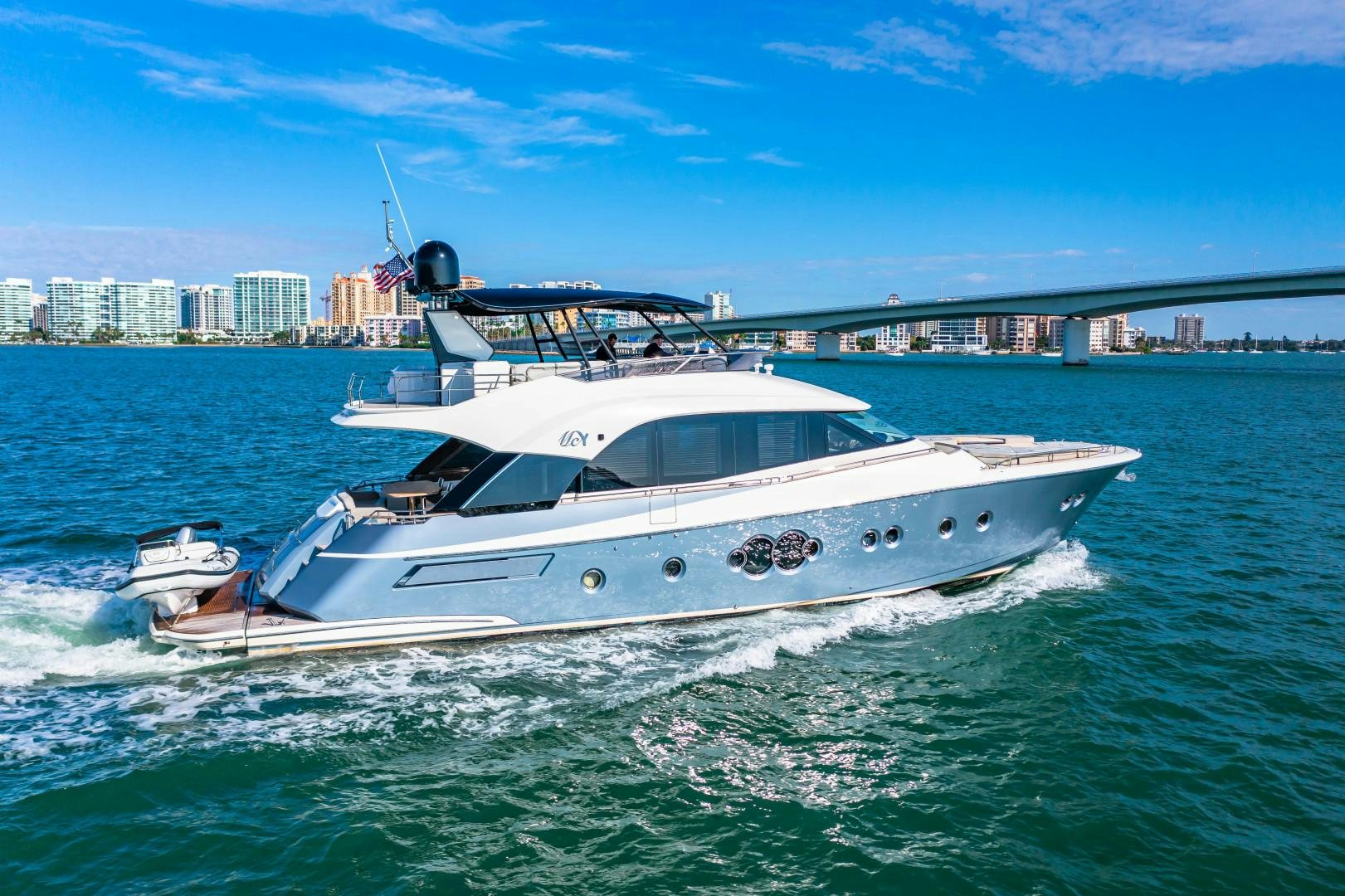 a white yacht on the water aboard MONTE CARLO Yacht for Sale