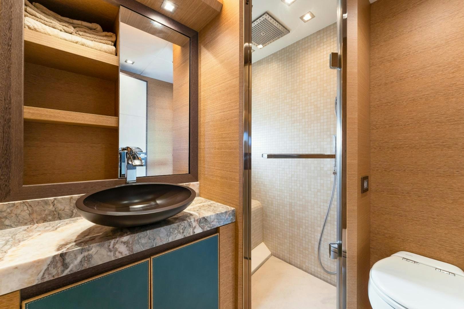 a bathroom with a sink and a mirror aboard MONTE CARLO Yacht for Sale